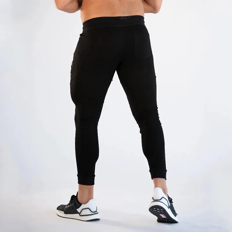 Nouveaux pantalons de course pour hommes pantalons de survêtement de fitness pour hommes collants re