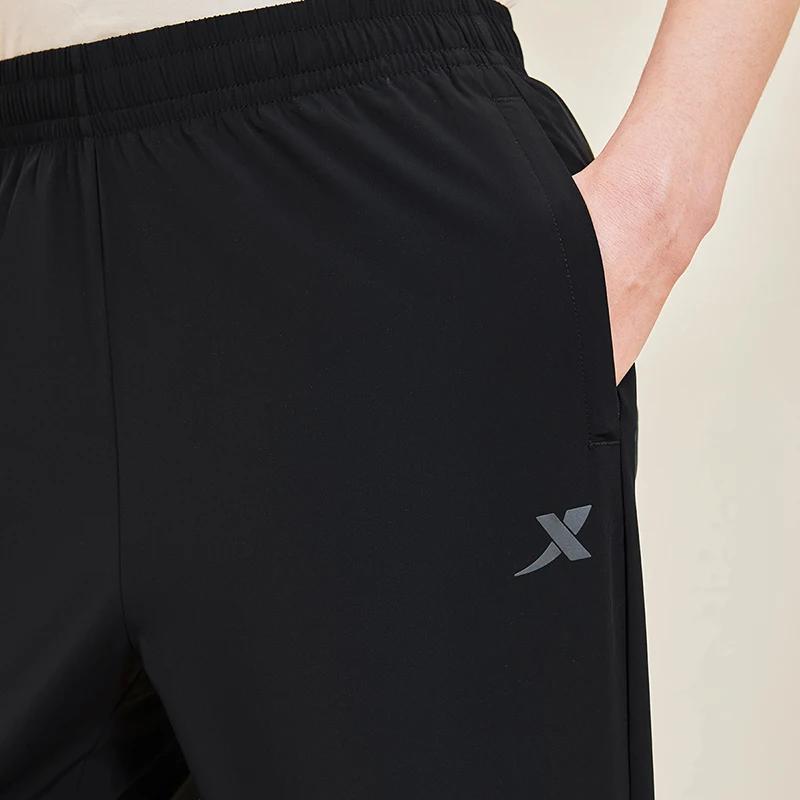 Xtep Little C pantalon pour hommes été pantalon absorbant la sueur à la mode rétro mode bas à séchag