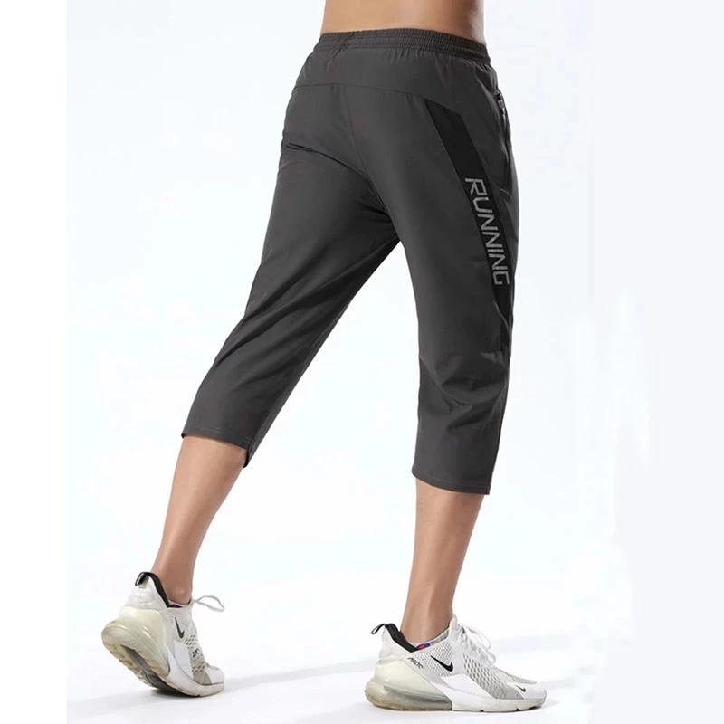 Pantalon sport homme poches zippées - Jogging entraînement 3/4 - Musculation football fitness running
