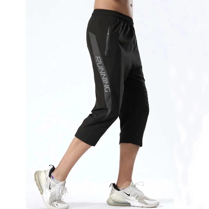 Pantalon sport homme poches zippées - Jogging entraînement 3/4 - Musculation football fitness running