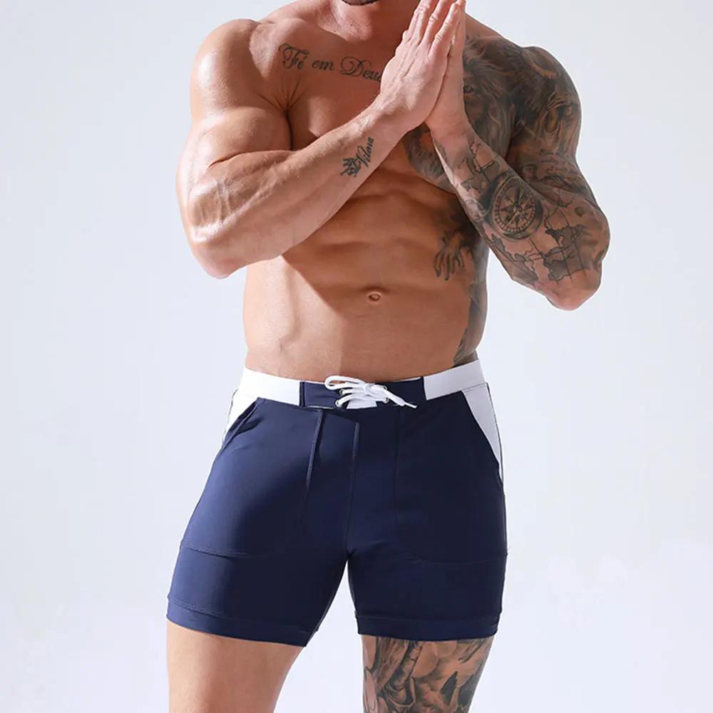 Maillot de bain extensible pour hommes, à séchage rapide, culotte de plage, avec poches, pour Sports