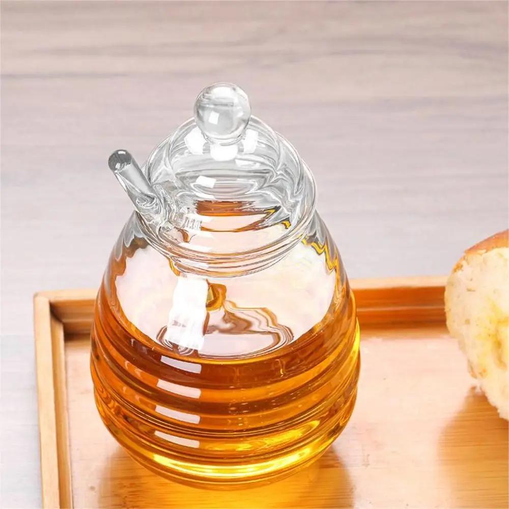 Pot de miel transparent avec louche et couvercle, accent d'abeille, précieux, cuisine, bouteille de