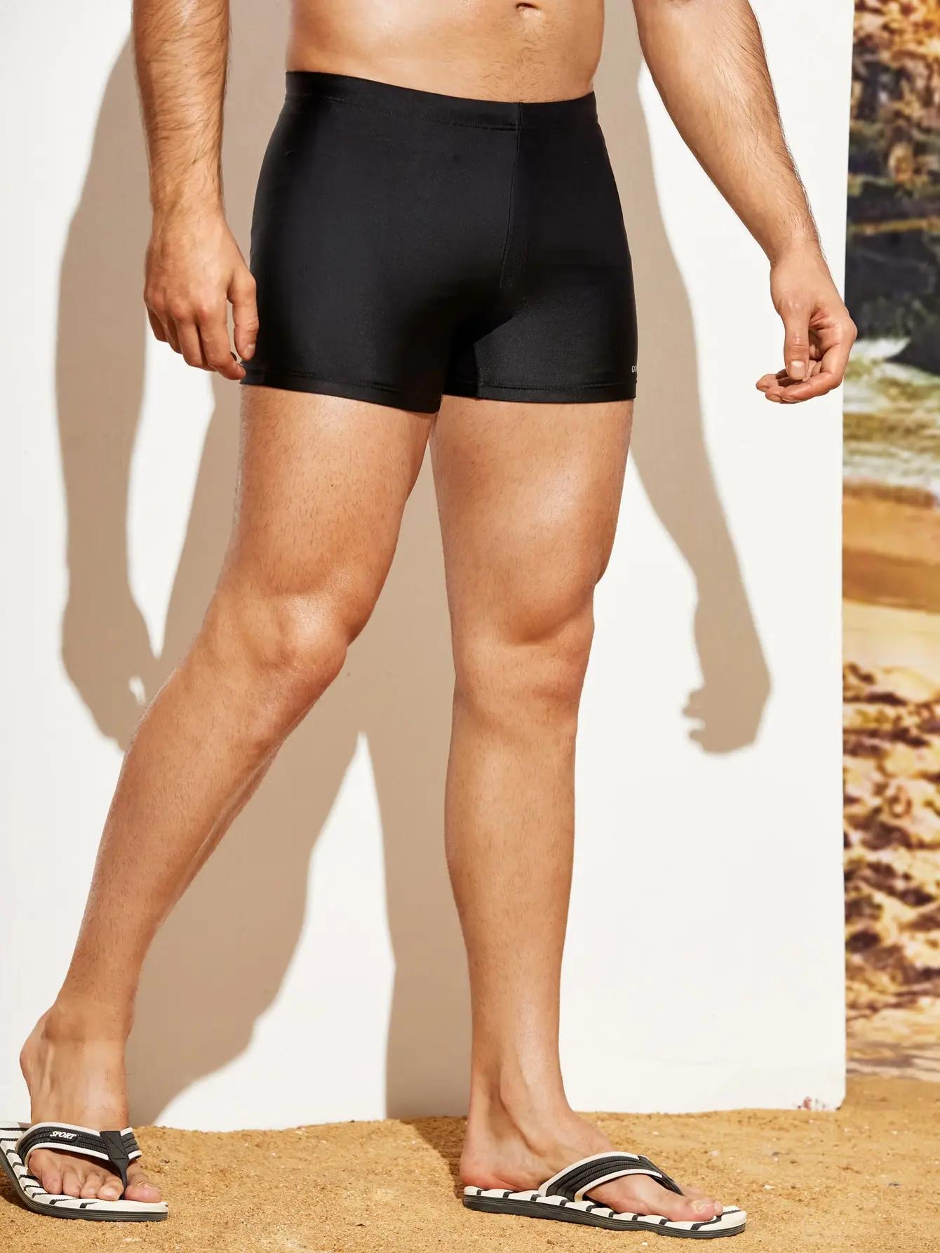 Pantalon de bain homme moulant à coins plats - Maillot de natation unie pour entraînement et sport aquatique