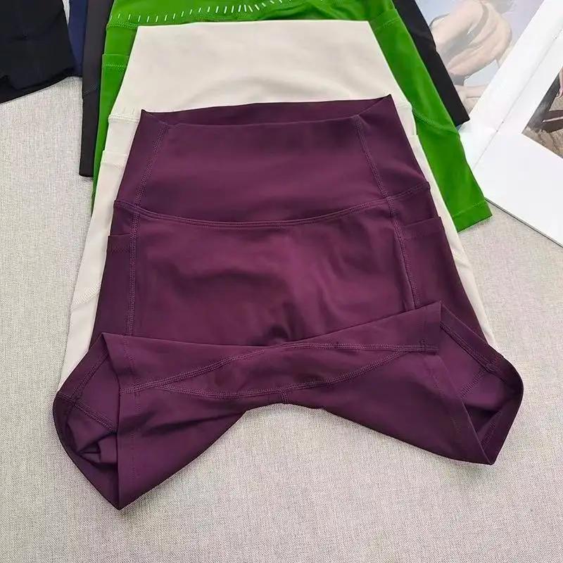 Short de Yoga taille haute pour femmes, avec poches latérales, longueur quater pour le cyclisme, le