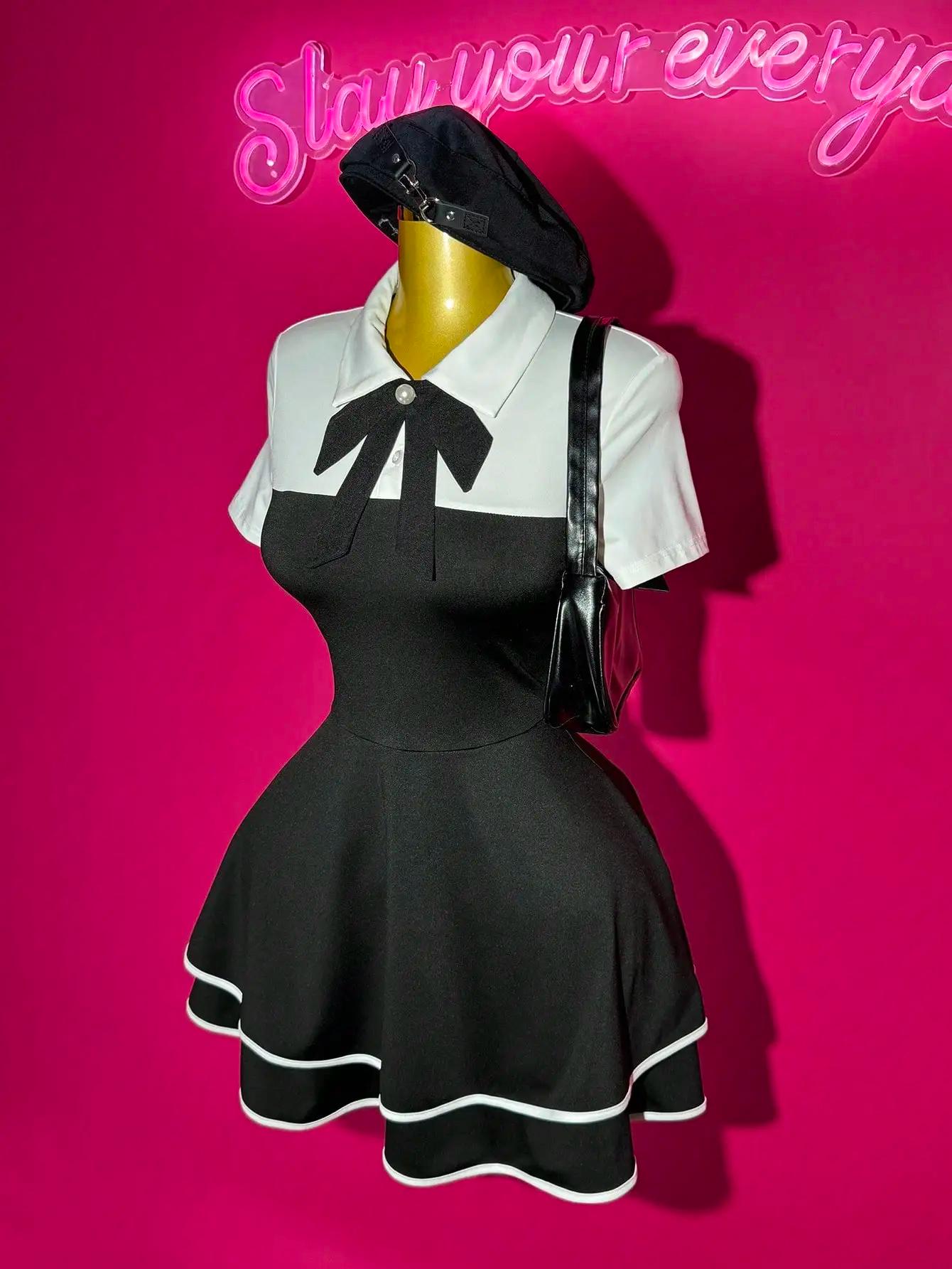 Mini robe bloc de couleur avec nœud papillon et col polo avec ourlet à volants, coupe trapèze pour u