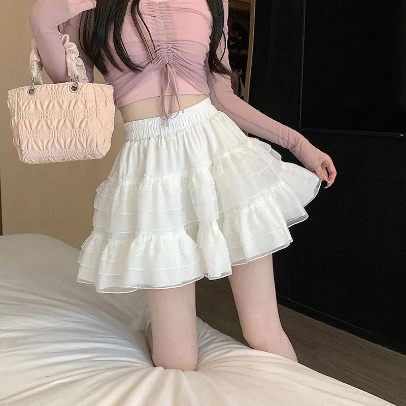 Nouveau dans les vêtements doux coréen décontracté été tendance blanc dentelle gâteau Mini jupe Ball