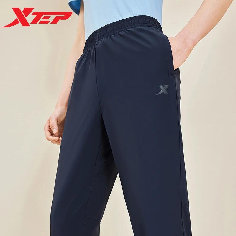 Xtep Little C pantalon pour hommes été pantalon absorbant la sueur à la mode rétro mode bas à séchag