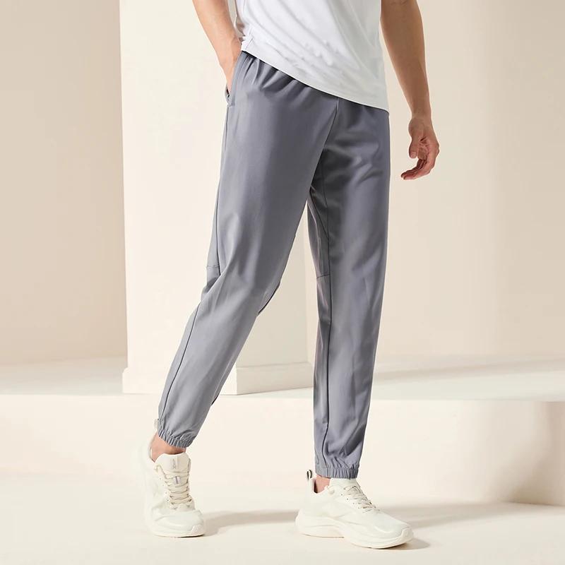 Pantalon de survêtement homme été respirant Xtep - Confort sportif quotidien pour activités plein air