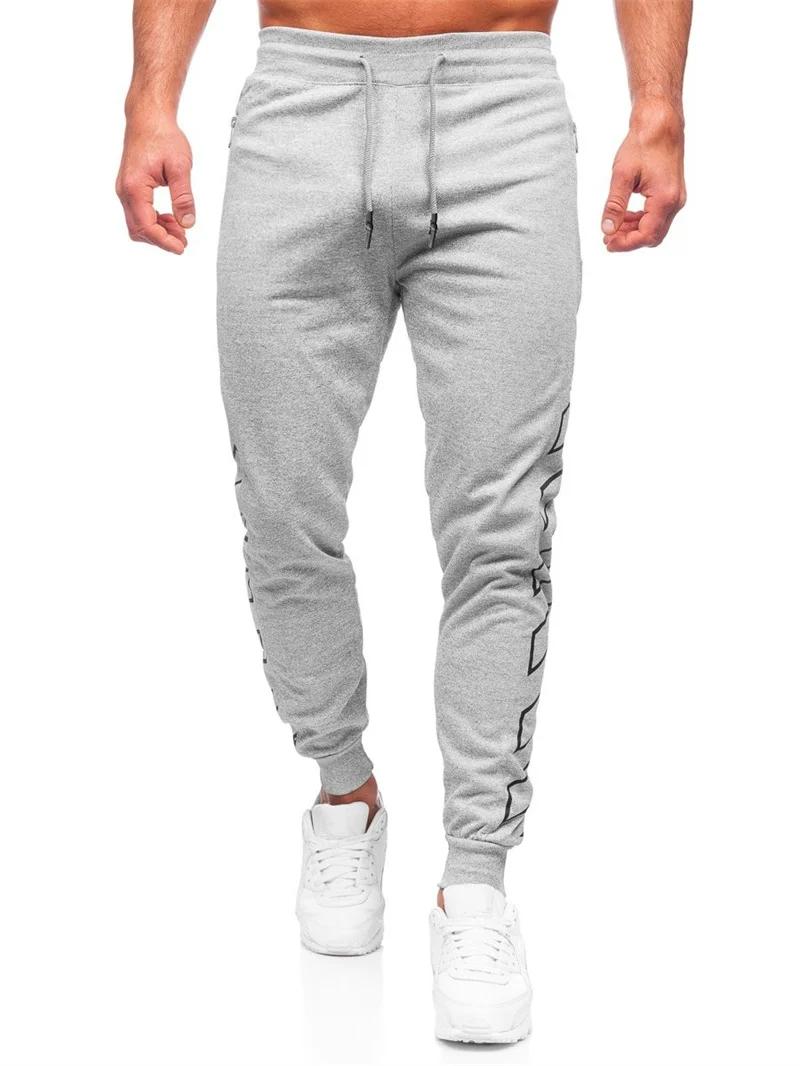 Printemps automne poche zippée hommes pantalons confortables pantalons de survêtement à séchage rapi