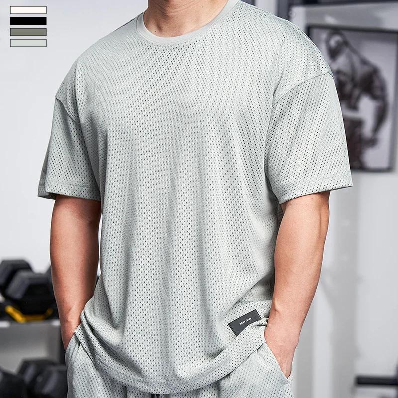 T-shirt musculaire homme gym - Chemise course tennis football entraînement ample séchage rapide