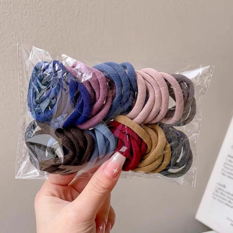 50 pièces coloré Ealstic cheveux corde queue de cheval tenir Scrunchie élastique pour les femmes de