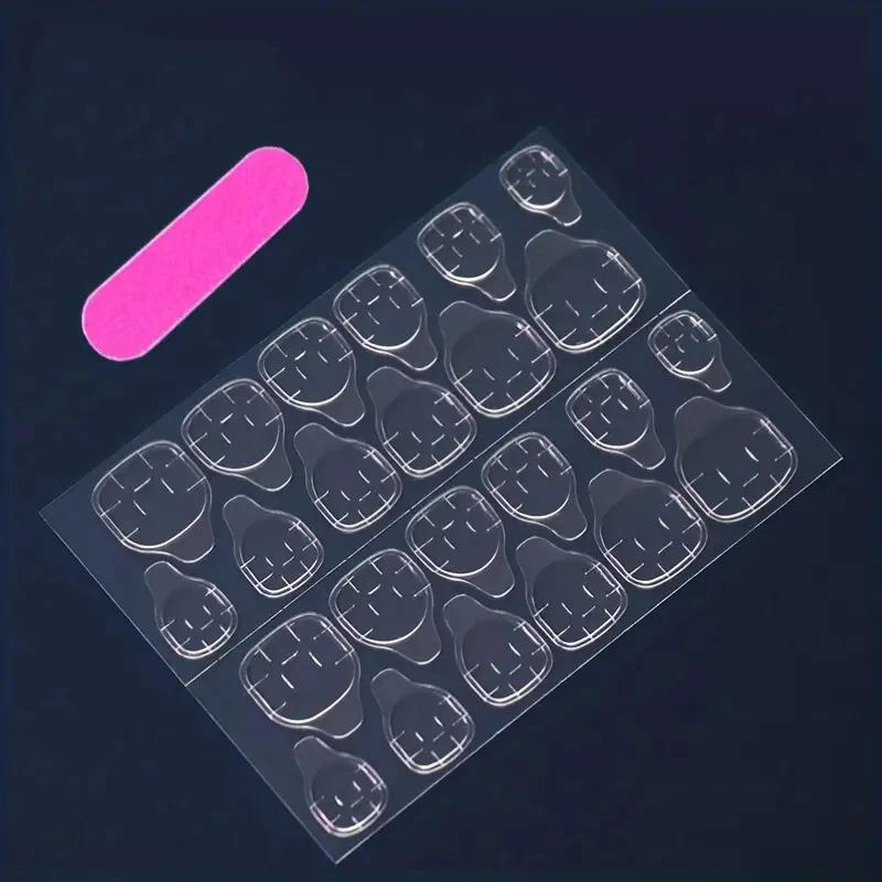 Un ensemble complet de 24 faux ongles moyens en forme de cercueil avec un design dégradé pêche, comp