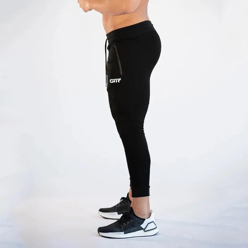 Nouveaux pantalons de course pour hommes pantalons de survêtement de fitness pour hommes collants re