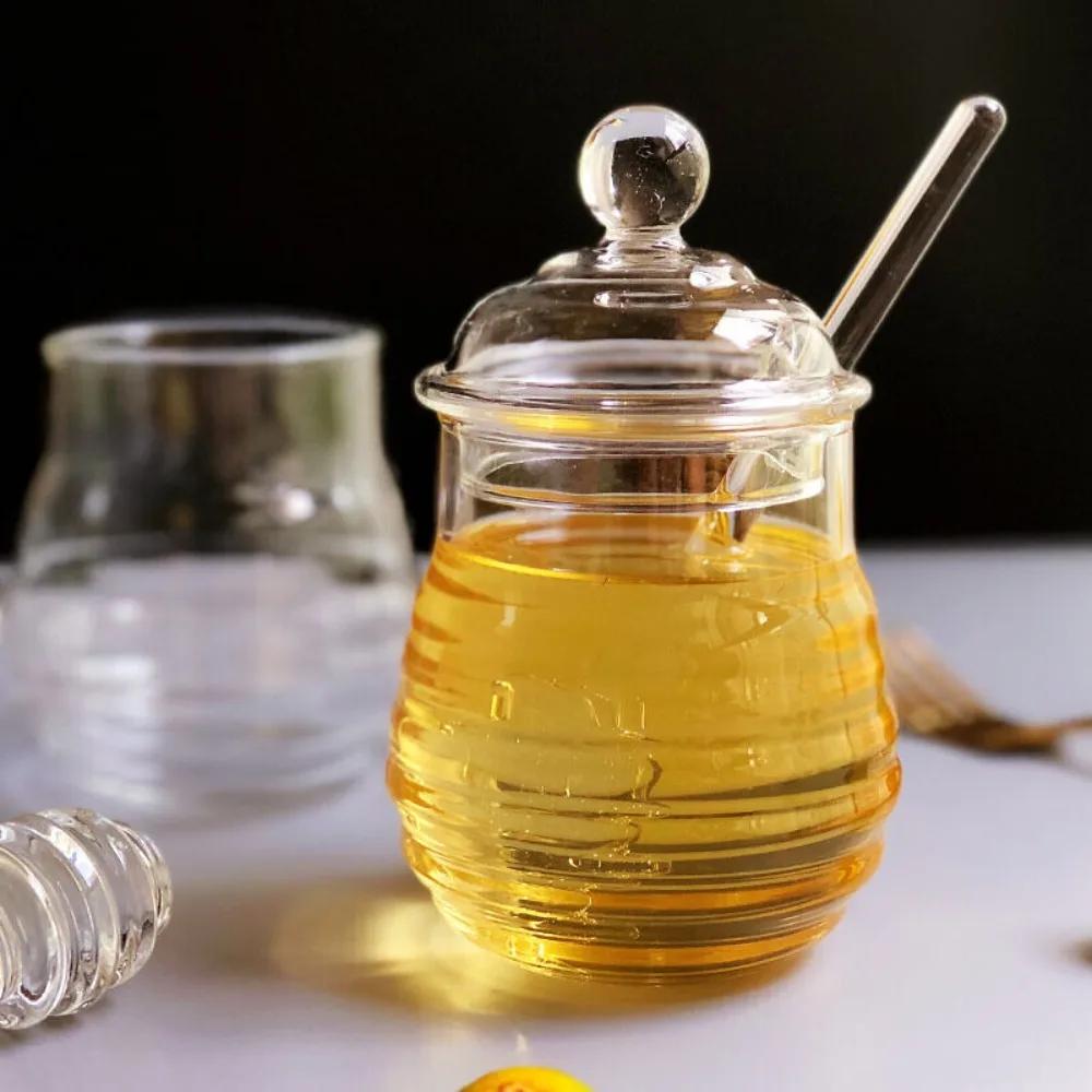 Pot de miel transparent avec louche et couvercle, accent d'abeille, précieux, cuisine, bouteille de