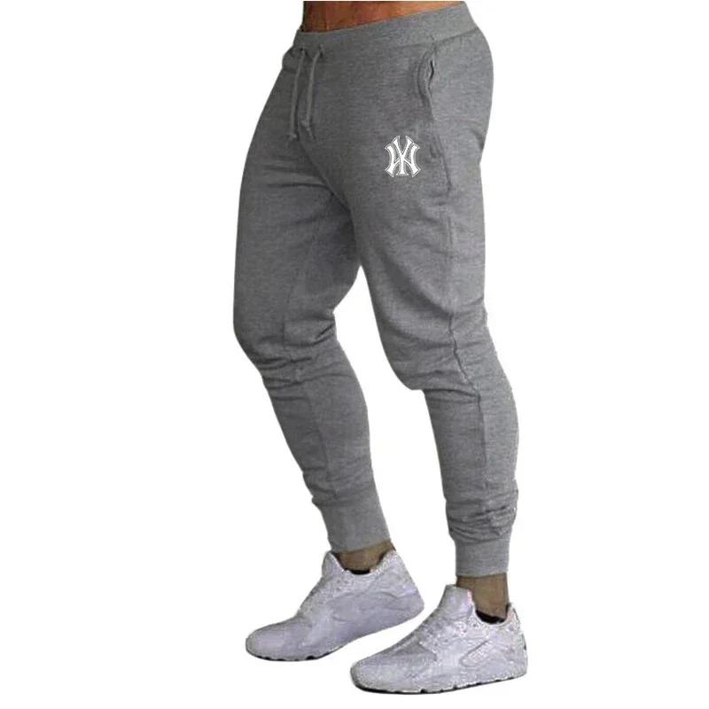Homme pantalon été pantalon décontracté nouveau dans les hommes vêtements Fitness Sport Jogging survêtements pantalons de survêtement Harajuku Streetwear pantalon mince