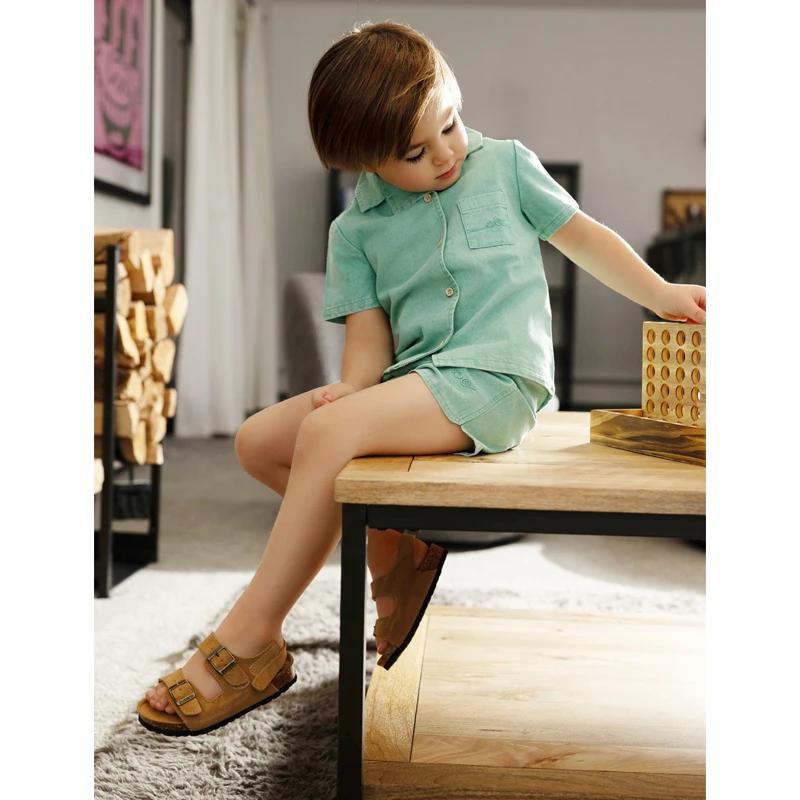 Collection Ali Co SS26 Green Denim : vêtements en coton pour garçons et filles, robes, jupes, chemises et salopettes - RE-EN STOCK LE DÉBUT DU MAI