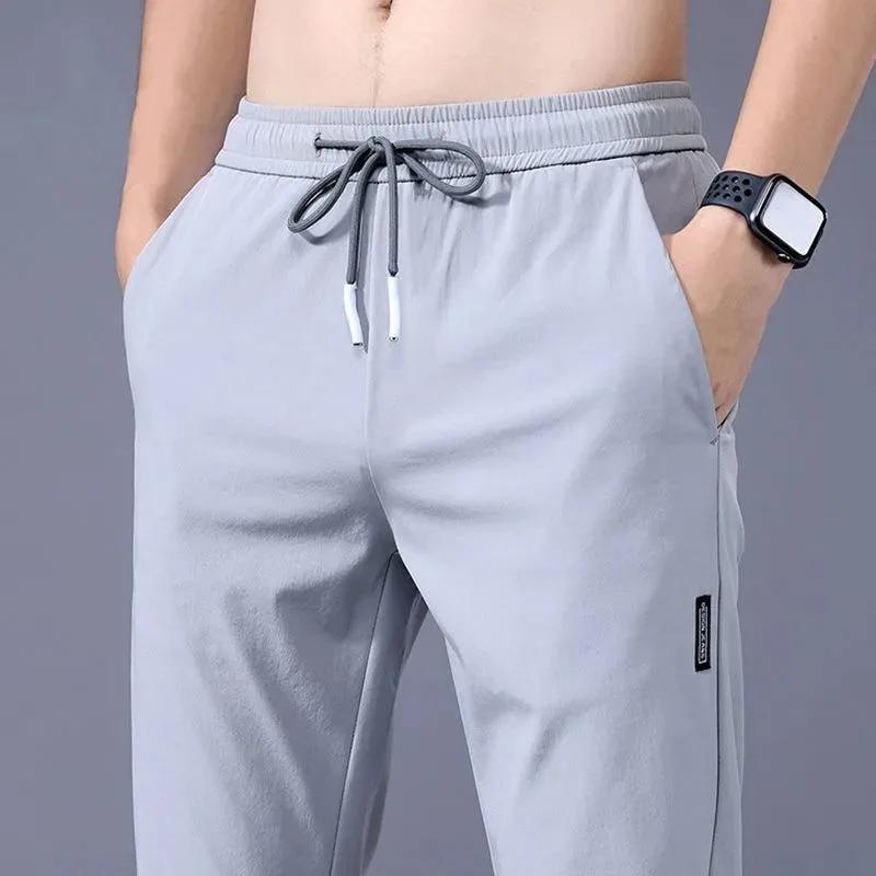 Pantalons pour hommes 2025 été nouveau noir gris mince affaires pantalons décontractés en plein air élastique respirant jambe droite pantalons de survêtement