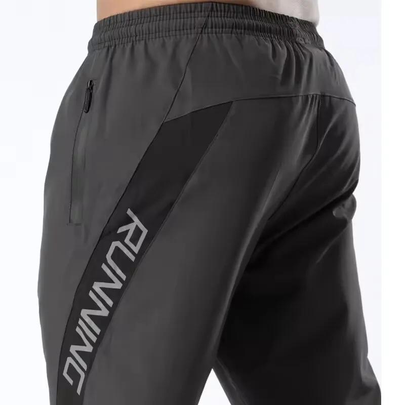 Pantalon sport homme poches zippées - Jogging entraînement 3/4 - Musculation football fitness running