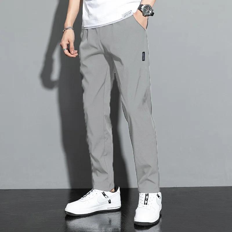 Pantalons pour hommes 2025 été nouveau noir gris mince affaires pantalons décontractés en plein air élastique respirant jambe droite pantalons de survêtement