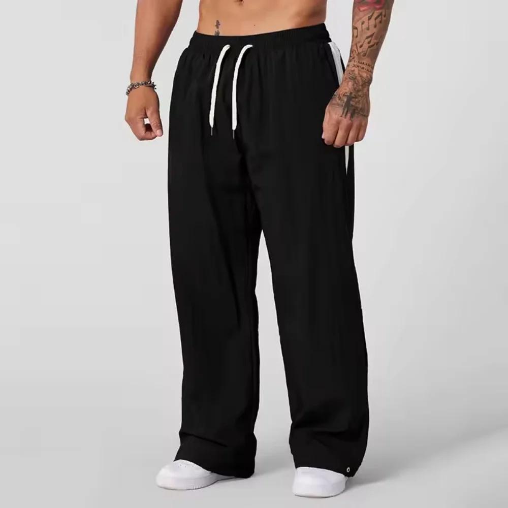Pantalon de survêtement pour hommes, ample, décontracté, jambes larges, tendance, sport, épissage, respirant, pantalon de sport américain, nouvelle collection automne 2025