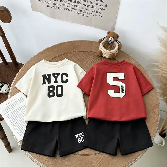 Ensemble de survêtement mode pour enfant t-shirt noir et short d été tenue à col rond pour bébés garçons et filles ensemble short à manches courtes pour activités quotidiennes sorties familiales et occasions spéciales