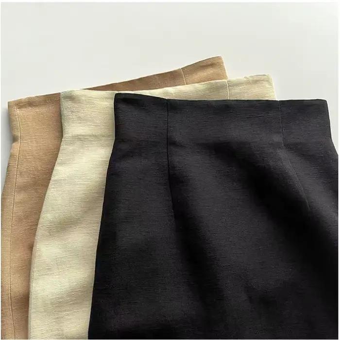 Jupe simple taille haute en lin et laine, atmosphère artistique espagnole, ourlet texturé, fente lat