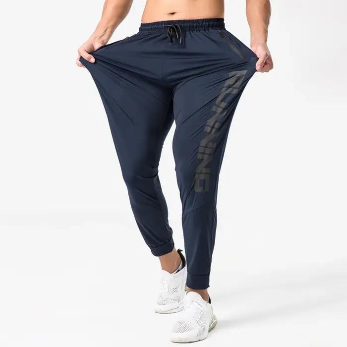 Pantalon survêtement gym homme fitness mince ajusté séchage rapide course entraînement