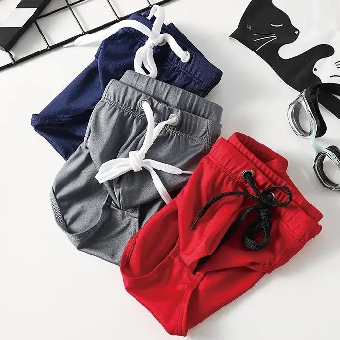 Slip de bain homme couleur unie taille basse avec cordon de serrage, séchage rapide, double couche,