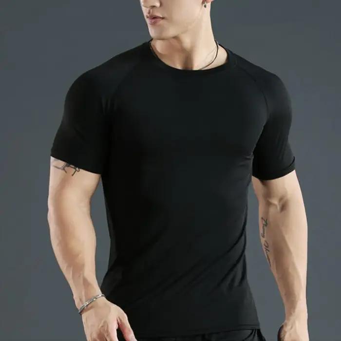 Hommes Compression course t-shirt Fitness serré à manches courtes t-shirt formation Jogging chemises