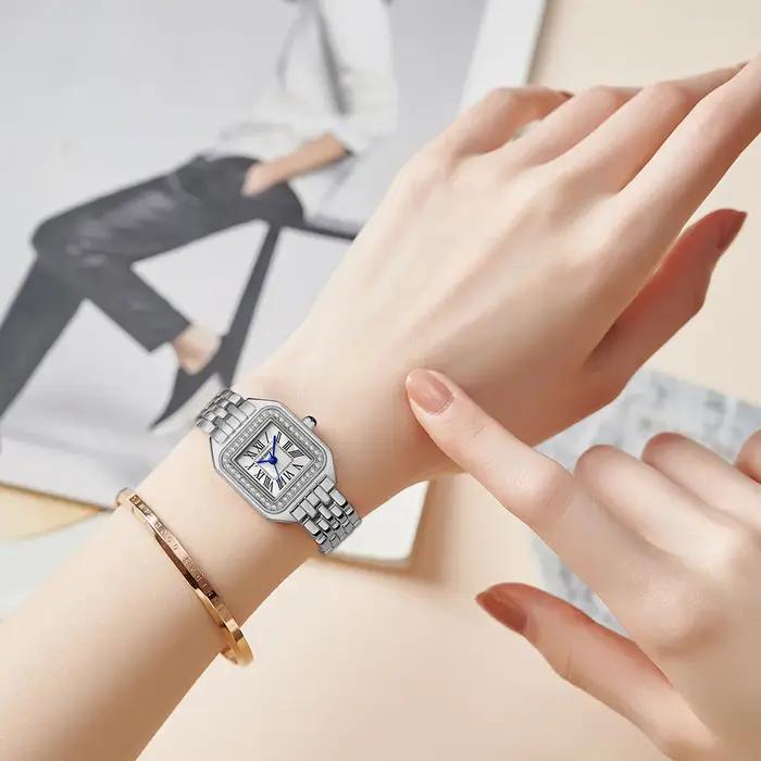 Nouvelles femmes montre lumière marque de luxe affaires or acier inoxydable dames mode montres à Qua