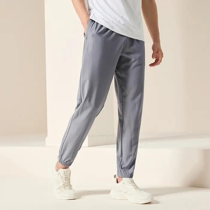 Pantalon de survêtement homme été respirant Xtep - Confort sportif quotidien pour activités plein air