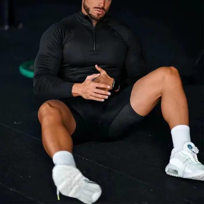 T-shirt de compression fitness homme manches longues demi-zip pour gym et course - Élastique et respirant