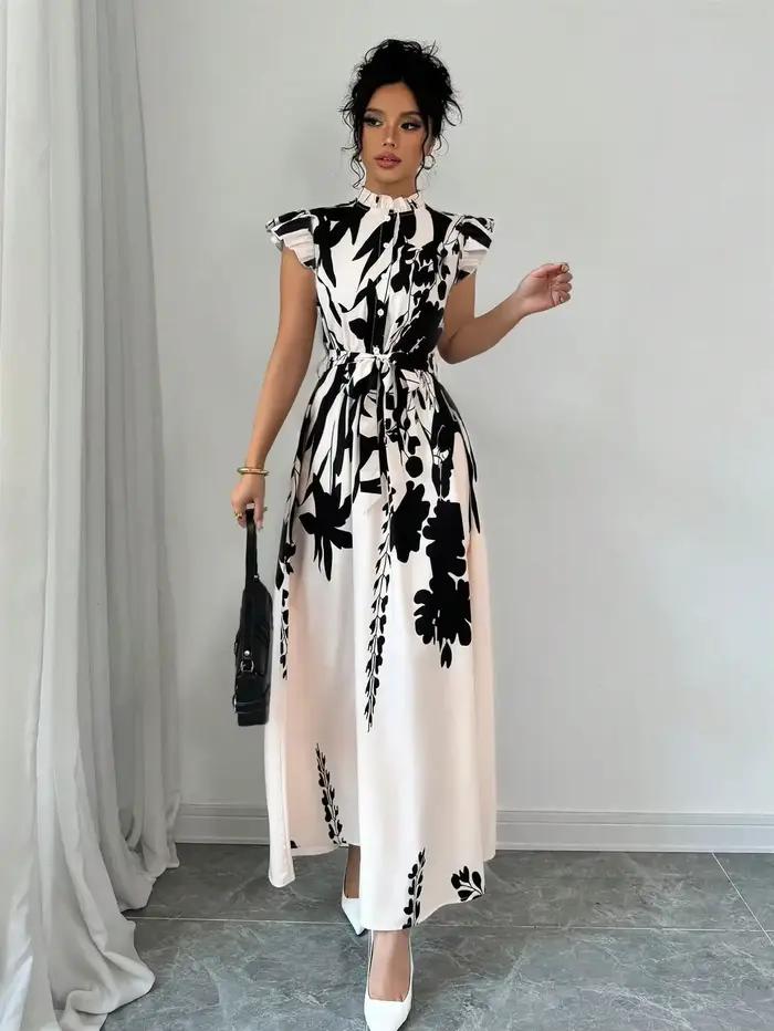 Robe élégante noire et blanche pour femme, idéale pour le travail, les rendez-vous et les vacances