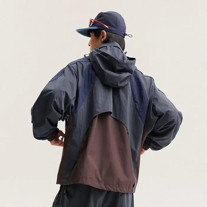 Veste cargo à capuche décontractée et ample pour homme et femme, imperméable, design à empiècements,