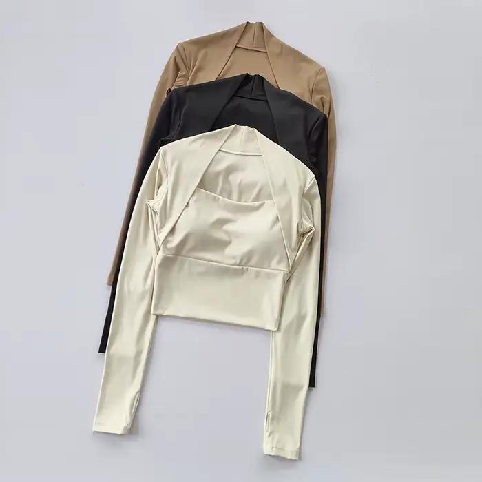 Haut de sport avec coussin de poitrine pour femmes - Élégance et soutien pour yoga et danse
