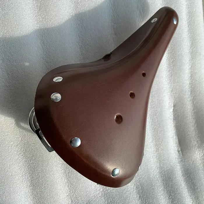 Selle de vélo en cuir respirante et confortable pour VTT, siège de cyclisme rétro avec coussin pour