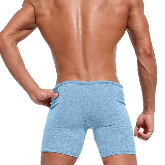 Short d'été respirant pour homme avec cordon de serrage idéal pour la course et le fitness couleur unie occasion sportive et quotidienne