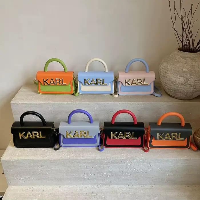 Sac à couches de rangement pratique avec plusieurs petites poches pour sucettes, lingettes et autres