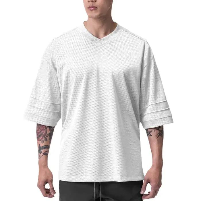T-shirt de course oversize à épaules tombantes et col en V, manches courtes, en maille respirante po