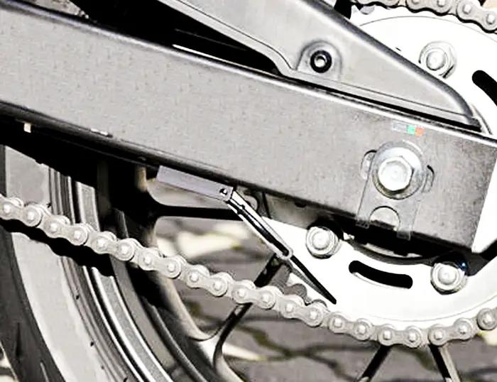 Système de lubrification de chaîne de huileur de lubrificateur de chaîne de moto pour Suzuki Honda Y