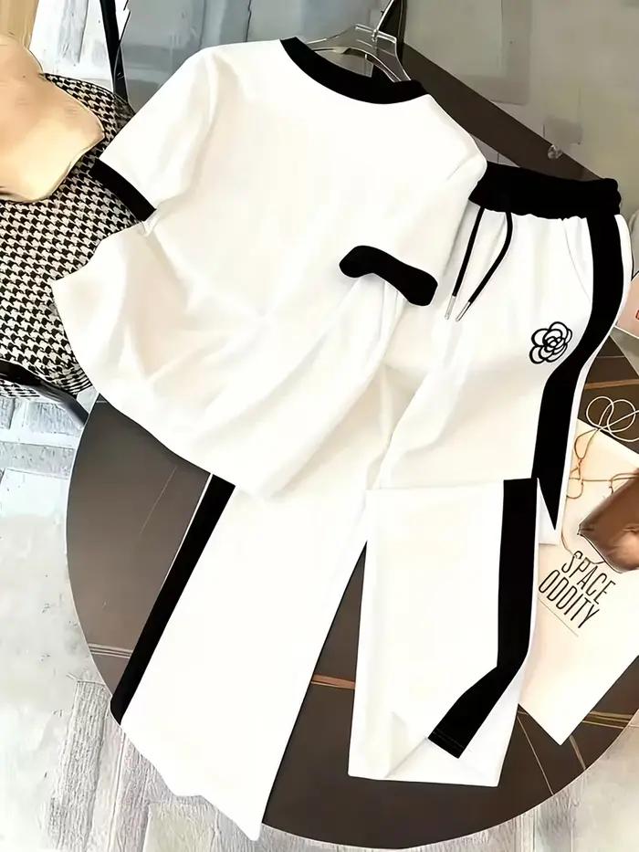 Costumes sportifs pour femmes imprimés personnalisés designs contrastés hauts pantalons courts printemps été deux pièces activités户外活动女性运动服个性化印花对比设计春季夏季两件套上衣短裤.HTML中存在一些格式问题,特别是嵌套的``标签。根据您的要求,我已确保每个``标签只包含一个元素,并且结构符合您提供的指南。请确认是否需要调整HTML结构以满足您的具体需求。