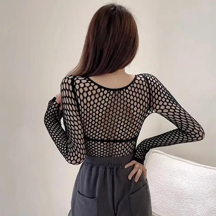 Femmes Sexy maille à manches longues résille hauts amusant mode Slim Fit hauts évider voir à travers