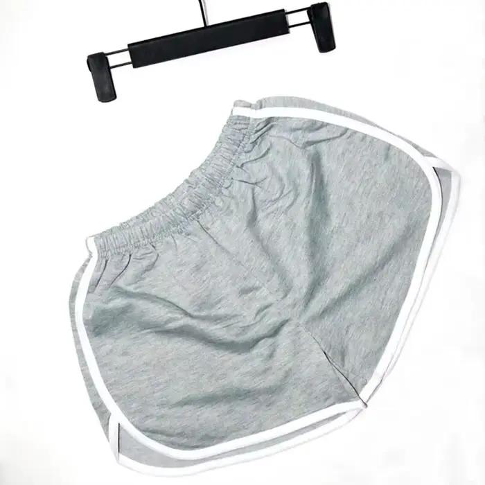 Short élastique pour femme ample séchage rapide course d'été fitness loisirs vêtements anti-externes activité physique occasionnels