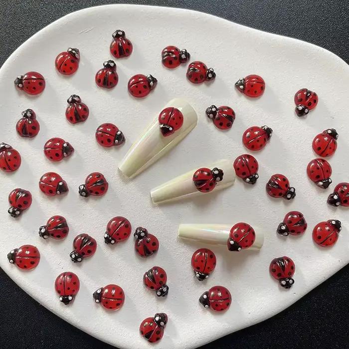 50 pièces mignon insecte coccinelle ongles breloques 3D résine coccinelles Nail Art strass 8*10mm ét