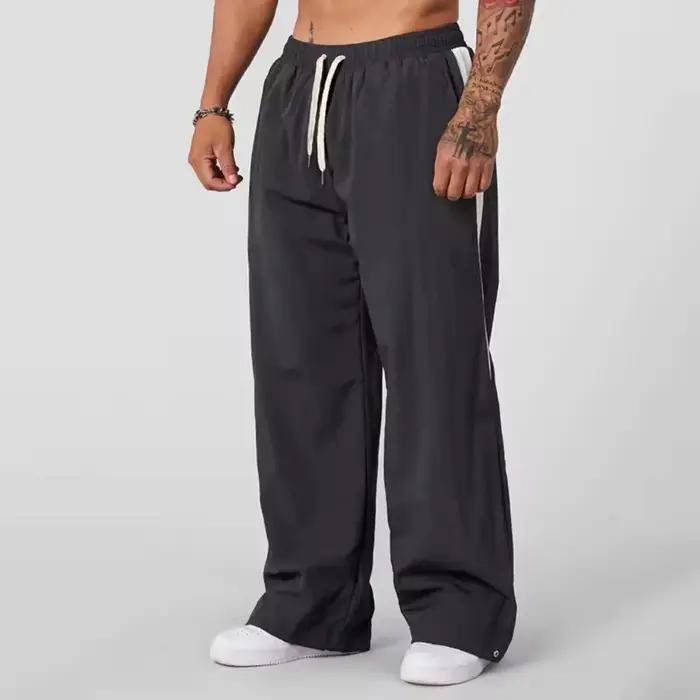 Pantalon de survêtement ample et décontracté pour homme jambes larges tendance sport épissage respirant nouvelle collection automne 2025