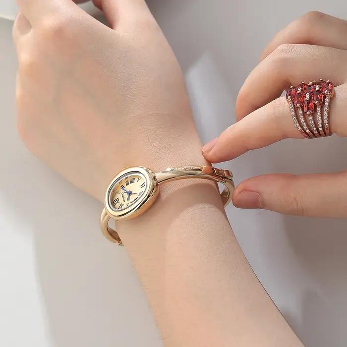Montre pour femme décontractée, polyvalente, simple et à la mode avec affichage à l'échelle romaine