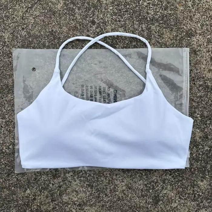 Soutien-gorge de fitness pour femmes couleur unie - Haut serré avec dos croisé et push-up pour l'entraînement complet