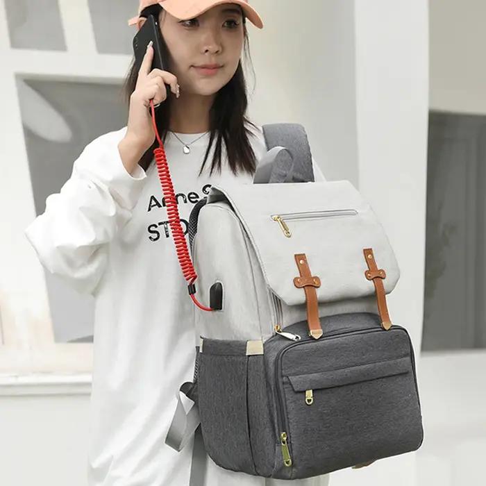 Sac de maman multifonctionnel avec coussin d'air de décompression, sac de mère et de bébé pour sorti